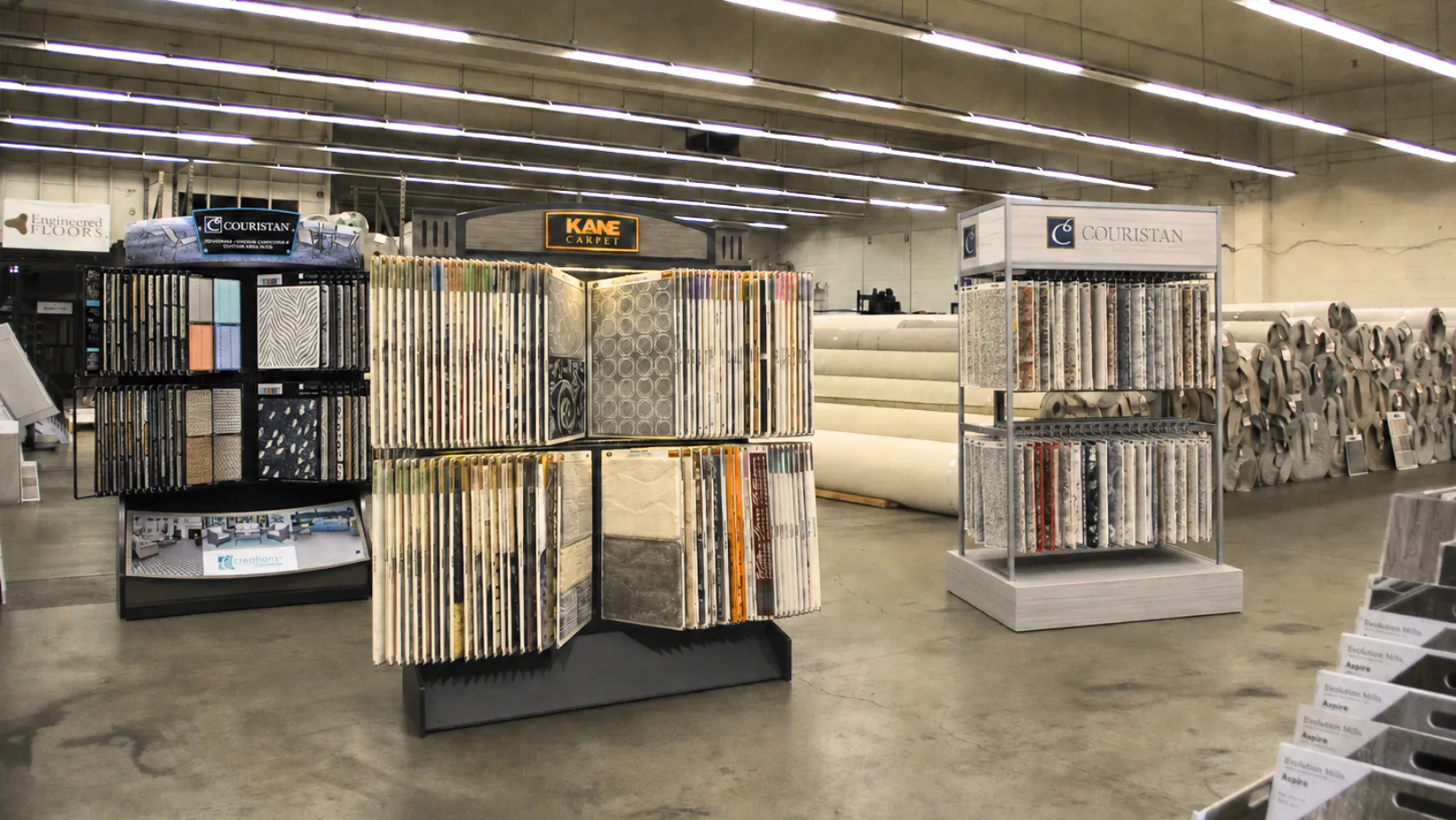 Kane Carpet and Couristan sample displays on the Carpet Depot showroom floor